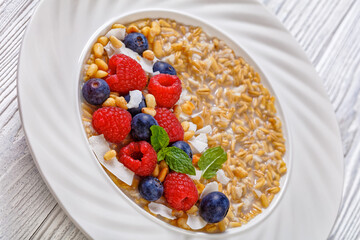 hulled whole grain oat porridge with berries
