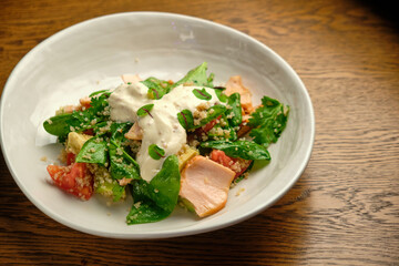 Grilled spicy lamb and salad wrapped in flatbread, with tomatoes