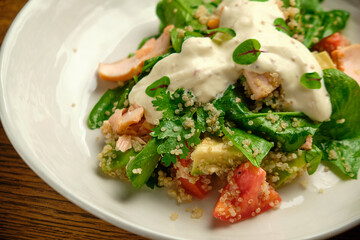 Grilled spicy lamb and salad wrapped in flatbread, with tomatoes