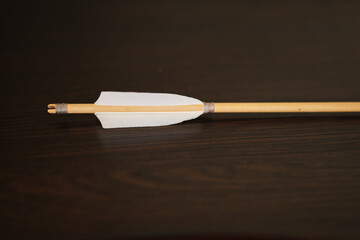 close-up plumage of an arrow for archery on a blurred background. white plumage close up s for...