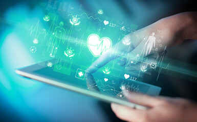 Close-up of a touchscreen with healthcare icons