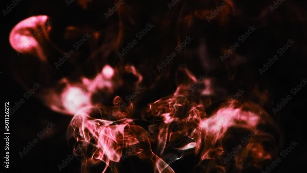 Poster Realistic cloud smoke with streamline pattern. Abstract red smoke on dark background in slow motion.