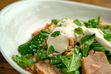 Grilled spicy lamb and salad wrapped in flatbread, with tomatoes