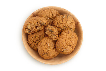 oatmeal cookies in wooden bowl isolated on white background with clipping path and full depth of field. Top view. Flat lay