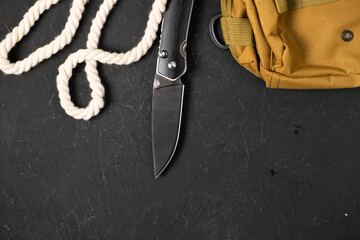 sharp pocketknife on a black background