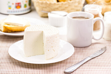 coffee with cheese, typical Brazilian breakfast, served with hot coffee and homemade cheese made in Minas Gerais