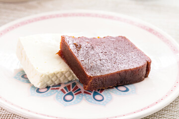 slice of guava jam with slice of Minas cheese, a traditional dessert from Brazil, known as Romeo...