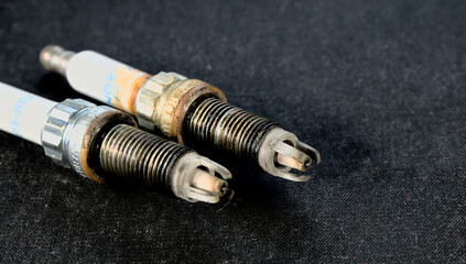 Old automobile glow plugs with a large output and chips. Car service at a car service