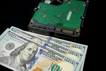 Electronic circuits, microchips, substrates for technology with dollars lying nearby. Electronics cost concept