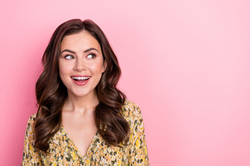 Fototapeta premium Photo of minded positive stunning lady look interested empty space imagine isolated on pink color background