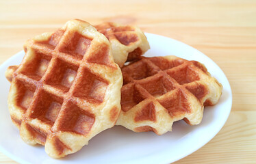 Closeup of Delectable Belgian Liege Waffles on a White Plate