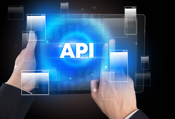 Close-up of a hand holding tablet