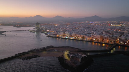 Fototapeta premium Drone flight over the Arresife town marina bay. Top view of Arresife town.