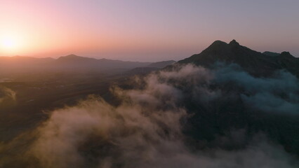 Top view of the sunrise over the mountains. Aerial view of Fuerteventura