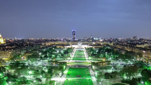 Champs de Mars from the Eiffel tower at night with rising Moon timelapse