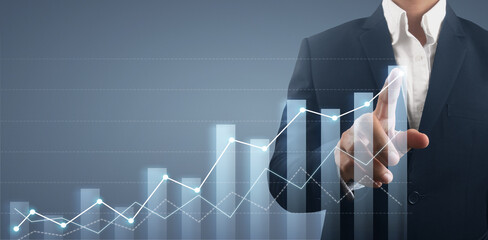 Hand touching  graphs of financial indicator market analysis chart