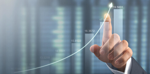 Hand touching  graphs of financial indicator market analysis chart