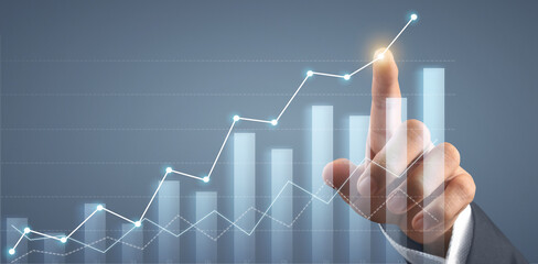 Hand touching  graphs of financial indicator market analysis chart
