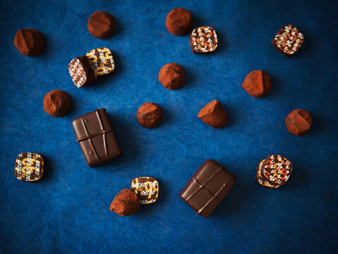 Assorted Chocolates on a Dark Blue Background