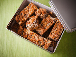 An Open Tin of Seven Layer Dream Bars.