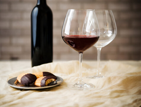 Glass of wine with cookies