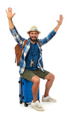 Cheerful man with summer clothing and luggage, white background