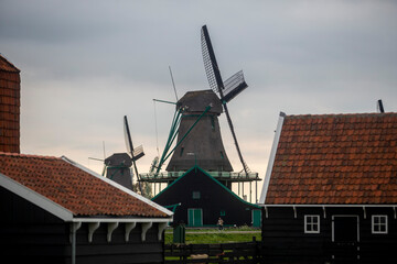 Windmills used for manufacturing of different products in Zannse Schans, Holland 04 25 2022