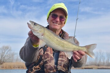 An angler with a walleye 