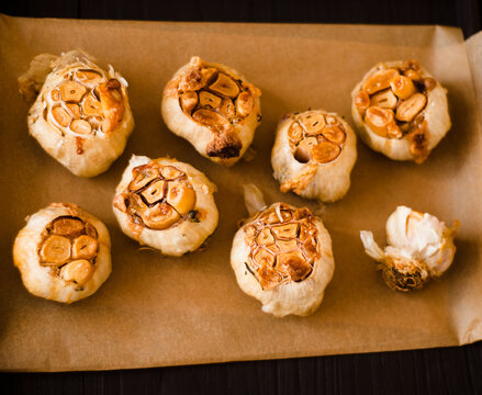 Roasted Garlic Bulbs on Parchment paper