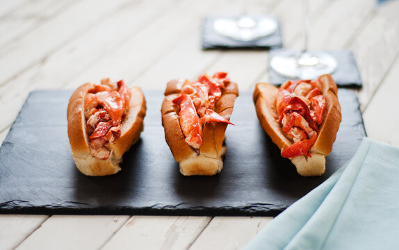Three Lobster Rolls on Slate.