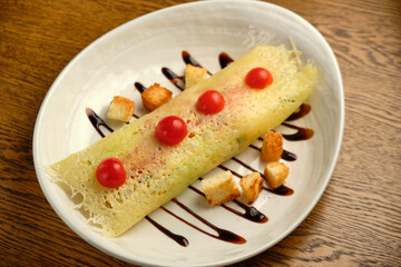 Grilled spicy lamb and salad wrapped in flatbread, with tomatoes