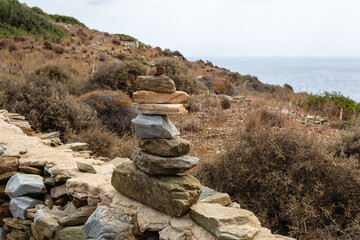 A composition of stones arranged on the coast of Ios Island. Cyclades, Greece