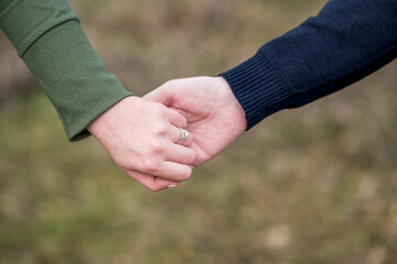 Couple holding hands