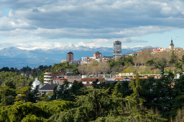 Fototapeta na wymiar View of the snowy Guadarrama mountains from the city of Madrid, Spain
