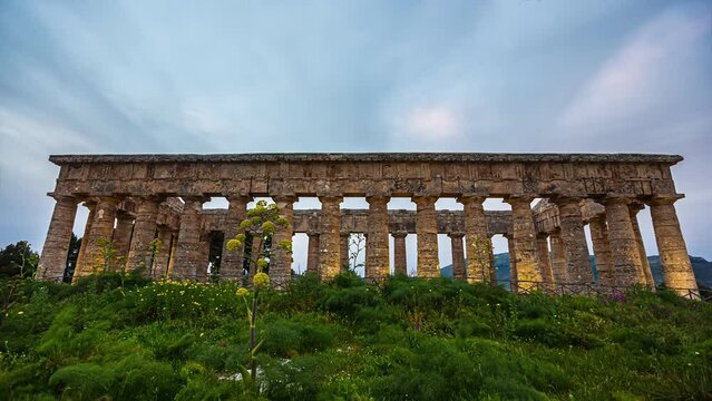 Dense Clouds in motion over historic Temple of Segesta on Sicily Island,Italy - Time lapse