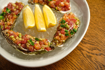 Beef tartar with salad and garlic toast on dark bread