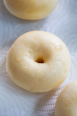 A round Japanese homemade doughnut or Bomboloni, sweet bakery prepared for fried with hot oil.