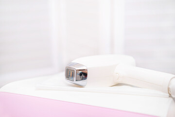 Device for diode laser hair removal, laser procedure at beauty studio or clinic, Body care epilation treatment, copyspace
