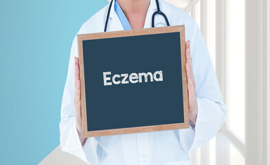 Eczema - Doctor shows information on blackboard.Doctor holding chalkboard with text.
