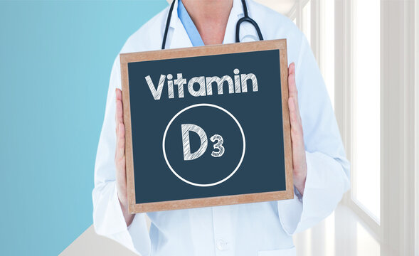 Vitamin D3 - Doctor shows information on blackboard.Doctor holding chalkboard with text.