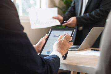 Close up hands of a business people take a meeting note to notebook