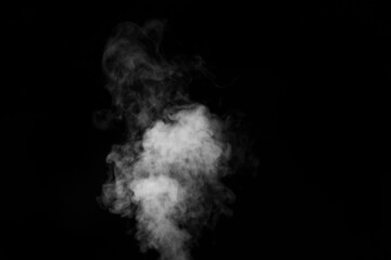 Curly white steam rising up and splashing water scattering in different directions isolated on a black background. Can be used as background, design element