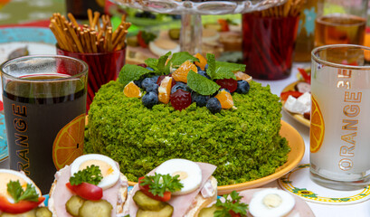 The spinach cake on a festive table