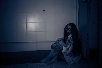Portrait of asian woman make up ghost face,Horror scene,Scary background,Halloween poster