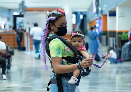 Mom and a baby at the airport