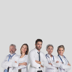 Fototapeta premium Successful medical doctors on gray