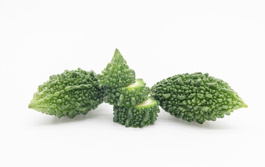 bitter gourd pieces isolated on white background, selective focus