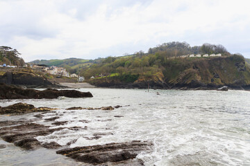 Rocky ocean coast in cloudy weather before a storm