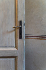 detail of an old vintage wooden door and wall 