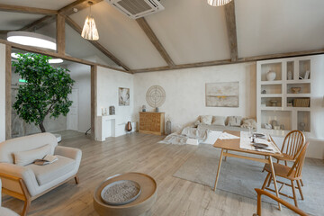 cozy warm home interior of a chic country house with an open plan, wood finishes, warm colors and a family hearth